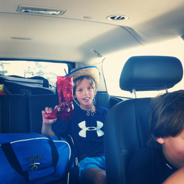 Armed with his Big Texan hat and boot shaped cup, Will is psyched to be heading home. 